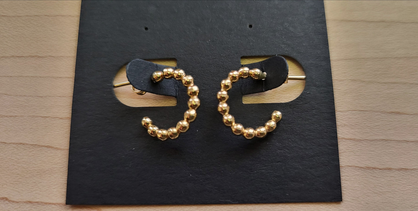 Anneaux de perles remplis d'or
