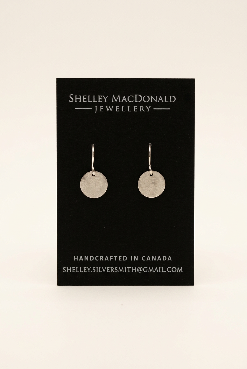 Small Circle Dangle Earrings with a cleaner background